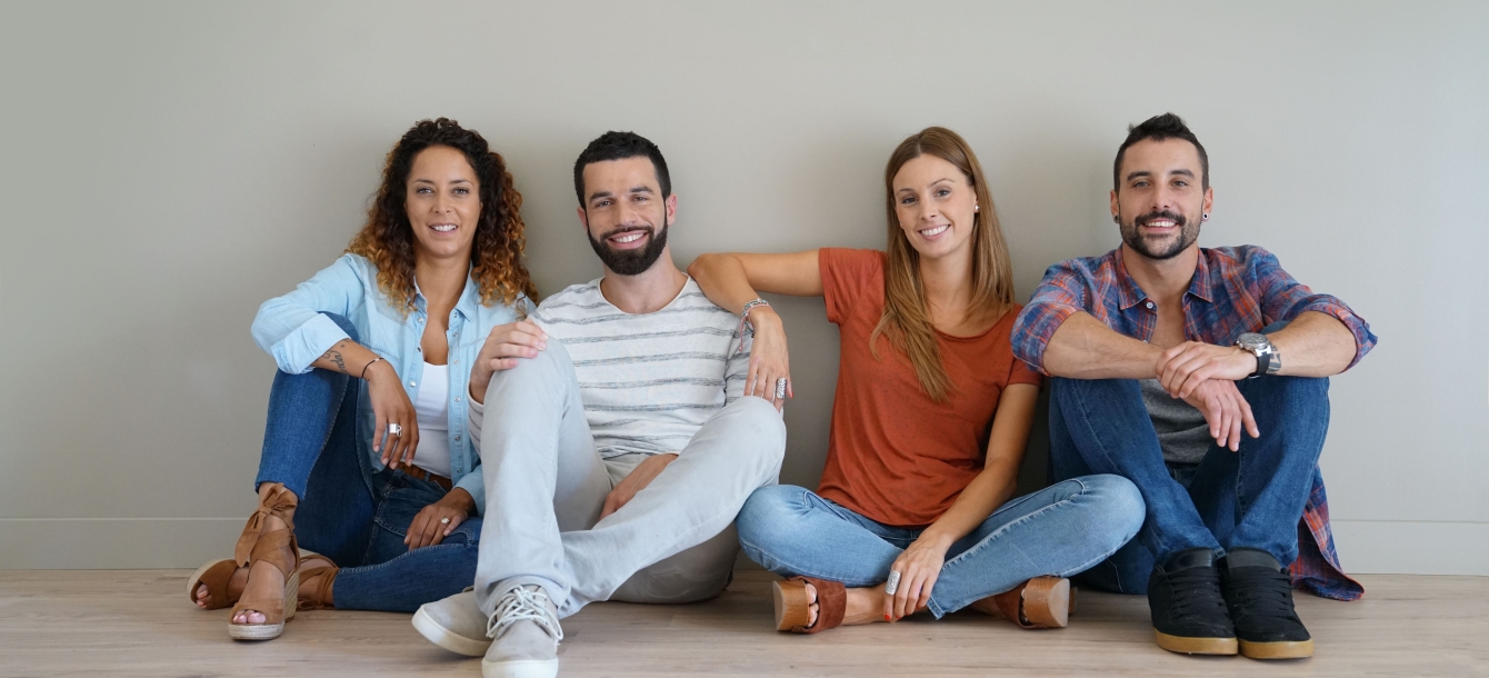 Group of friends sitting on the floor